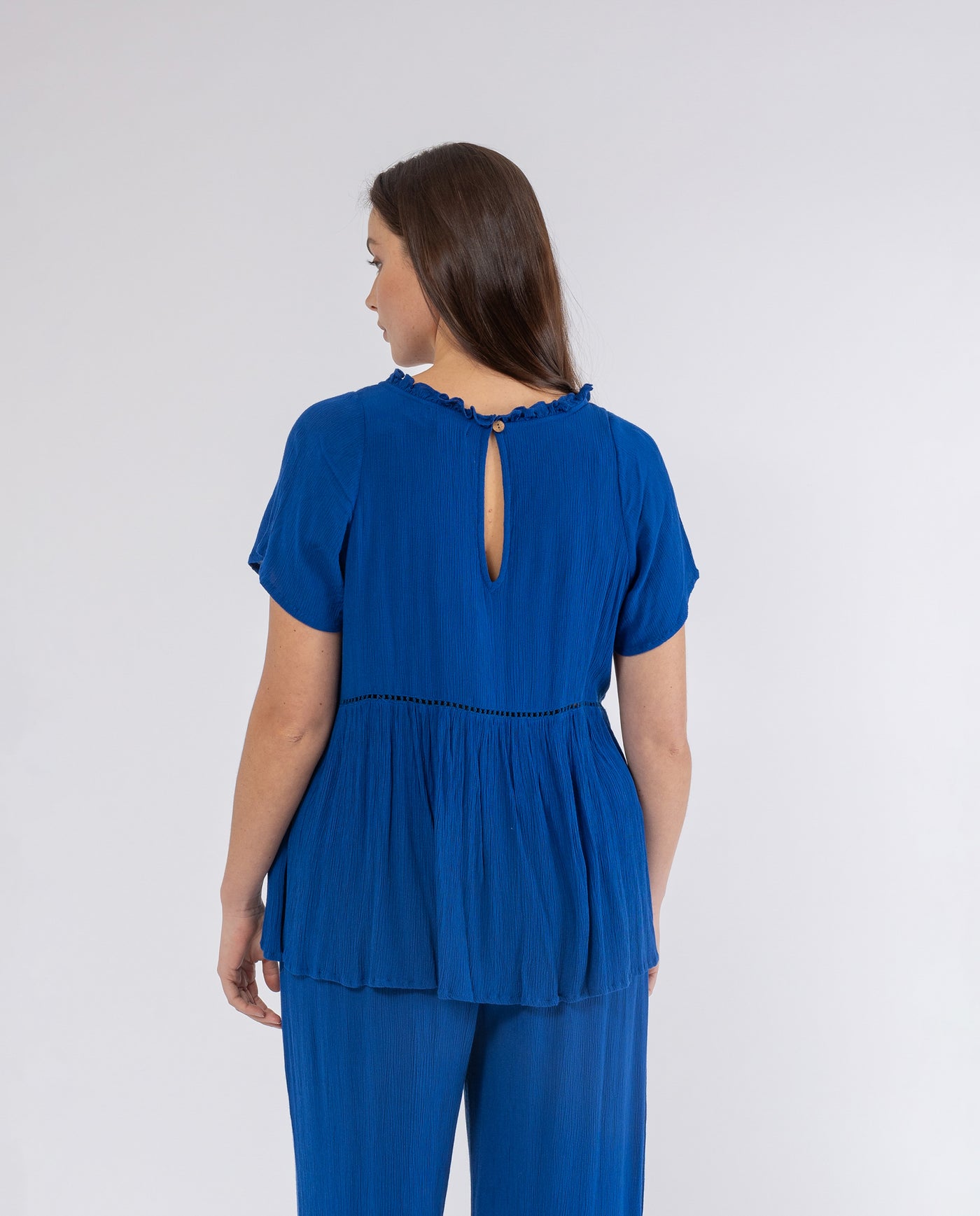 BAMBULA BLOUSE WITH COBALT BLUE POMPONS